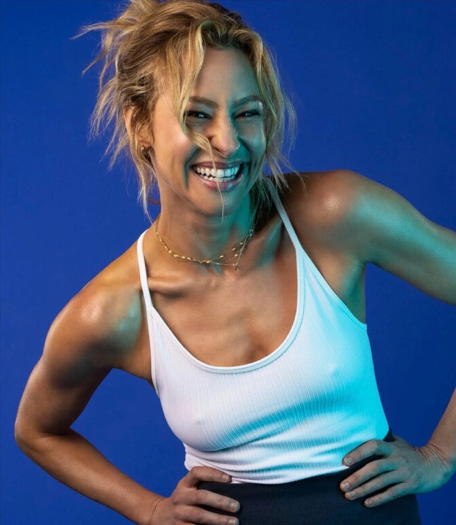 Marnie Alton laughing in workout gear